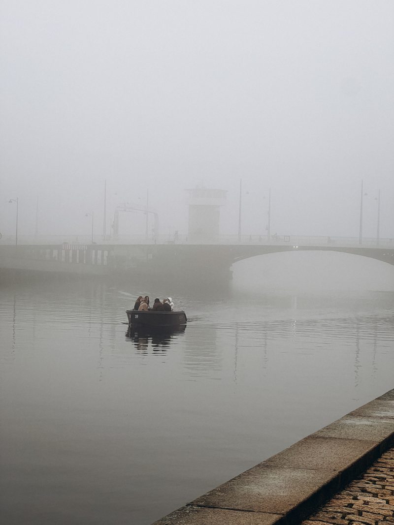 A small boat on the misty canal, Christianshavn