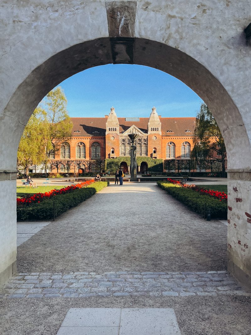 The archway framing the Library Garden and its formal beds