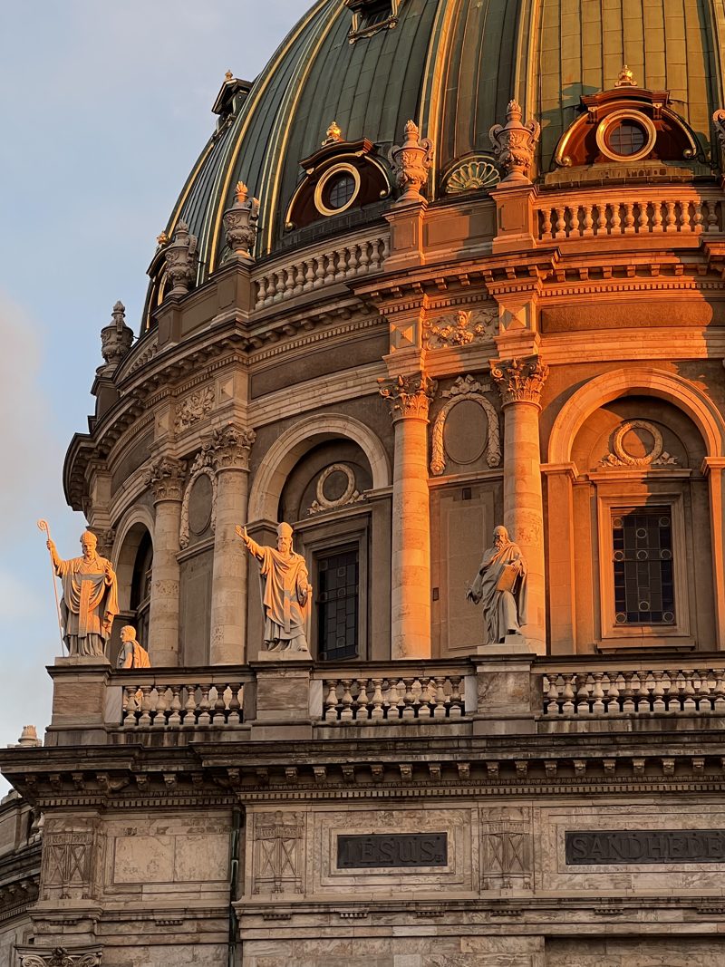 The dome and golden columns glowing at sunset