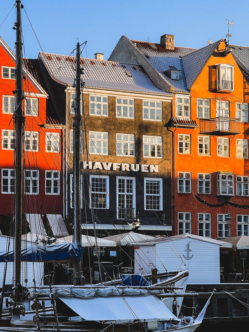 Orange façades and boats in the snow, Nyhavn