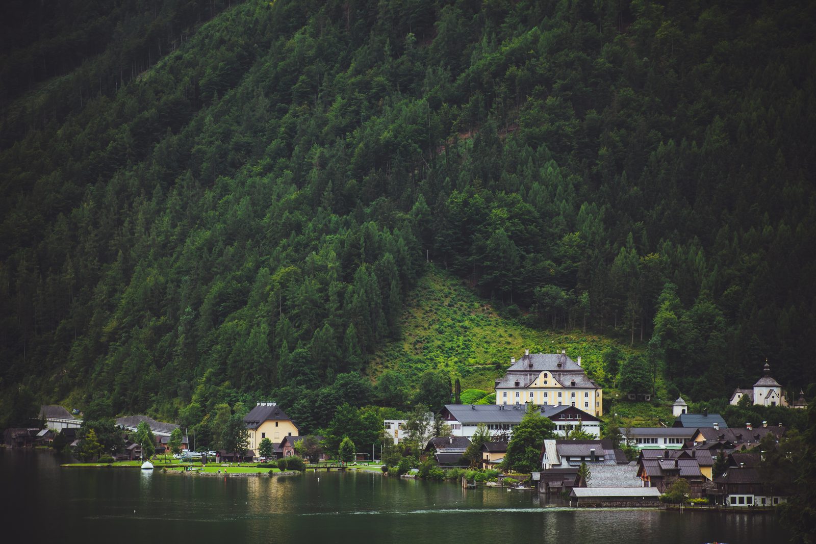 Lakeside village beneath the forest, Hallstatt, Austria