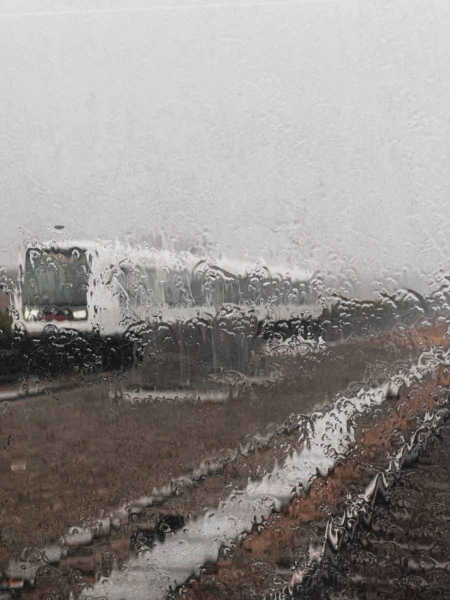 A train through rain-streaked glass, Copenhagen, Denmark